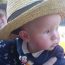 in sunny weather, it is imperative that the bairn should wear suitable head attire at all times